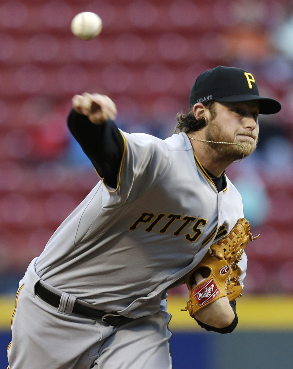 Pittsburgh Pirates starting pitcher Gerrit Cole throws against the Cincinnati Reds in the first inning of a baseball game, Tuesday, April 15, 2014, in Cincinnati. (AP Photo/Al Behrman)
