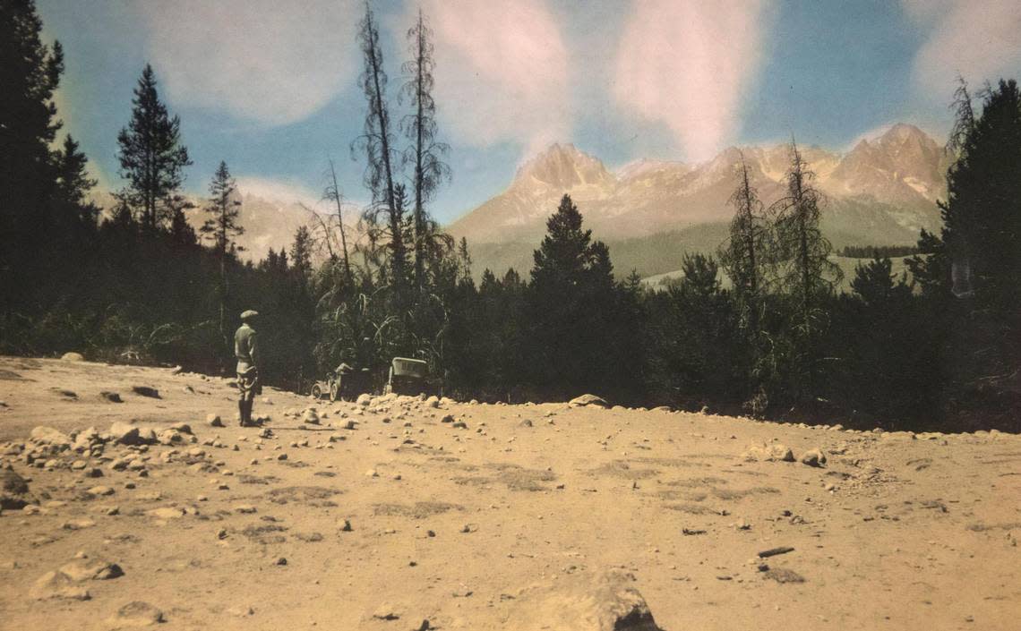 M.S. Benedict Benedict stands small against the backdrop of Mt. Heyburn, circa 1920. Benedict was the Sawtooth National Forest Supervisor from 1920-1934.