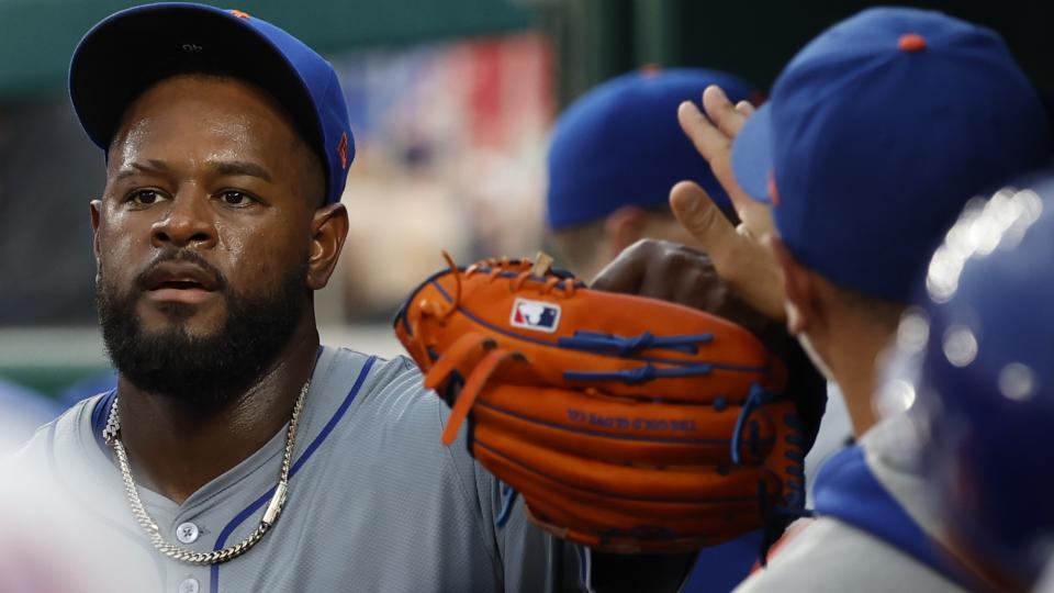 New York Mets pitcher Luis Severino (40) celebrates in the dugout with teammates after the eighth inning against the Washington Nationals at Nationals Park