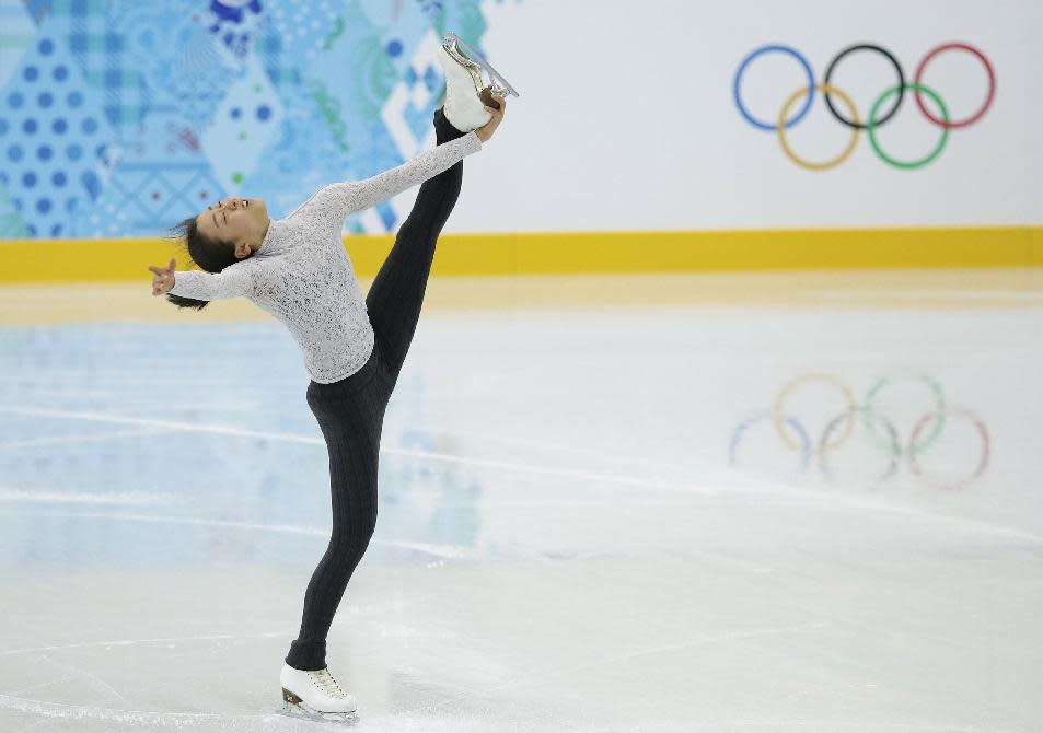 Mao Asada of Japan skates during a practice session at the figure stating practice rink at the 2014 Winter Olympics, Monday, Feb. 17, 2014, in Sochi, Russia. (AP Photo/Darron Cummings)