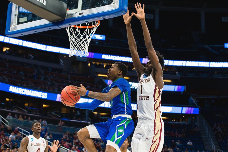 FGCU's Brandon Goodwin goes for a reverse layup in an NCAA tournament first-round game against Florida State at Amway Center in Orlando on Thursday, March 16, 2017. FSU defeated FGCU 86-80.