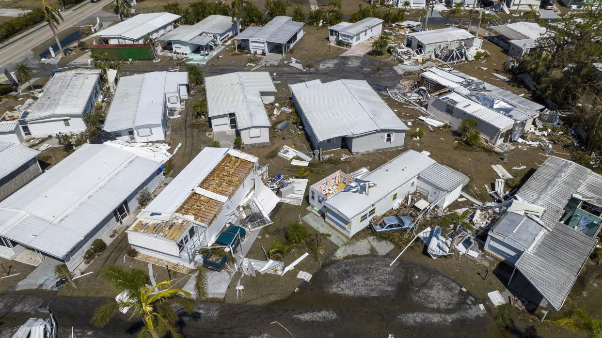 This is an aerial view of a damaged trailer park after Hurricane Ian passed by the area Saturday, Oct. 1, 2022, in Fort Myers, Fla.