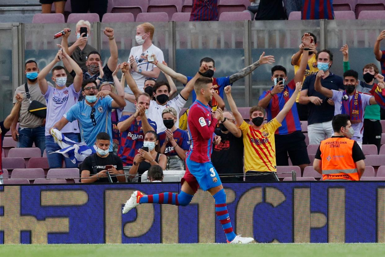 Soccer Football - LaLiga - FC Barcelona v Real Sociedad - Camp Nou, Barcelona, Spain - August 15, 2021 Barcelona's Gerard Pique celebrates scoring their first goal REUTERS/Albert Gea