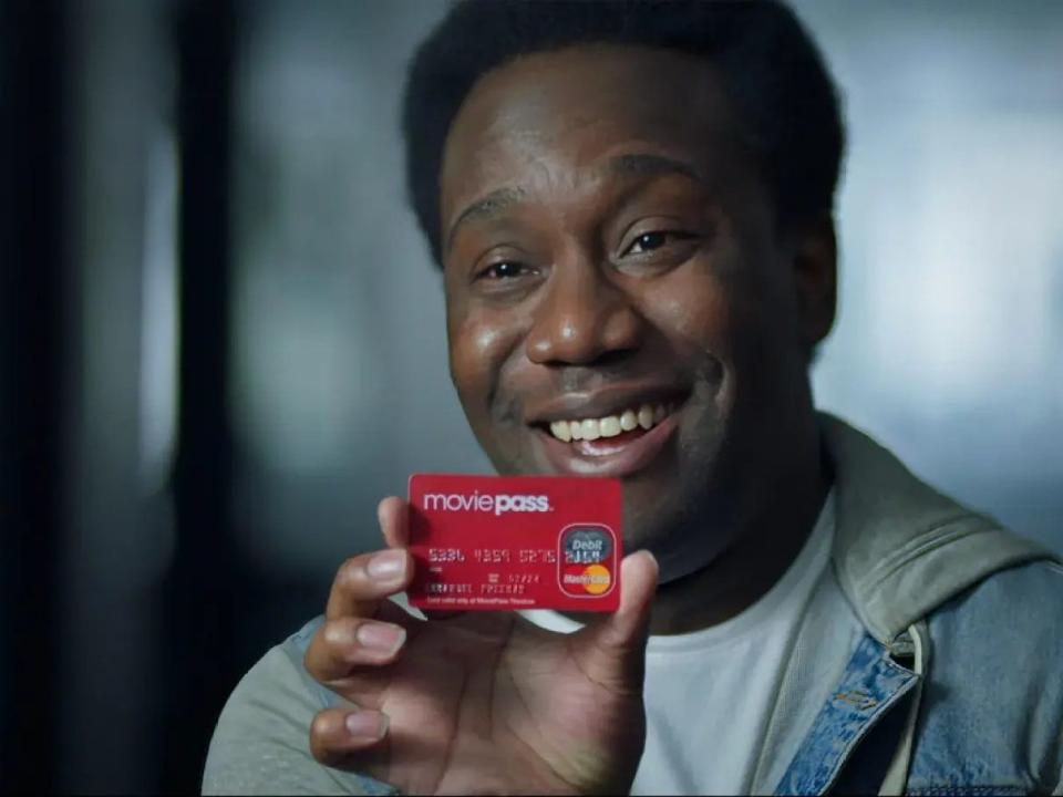 Man holding MoviePass card