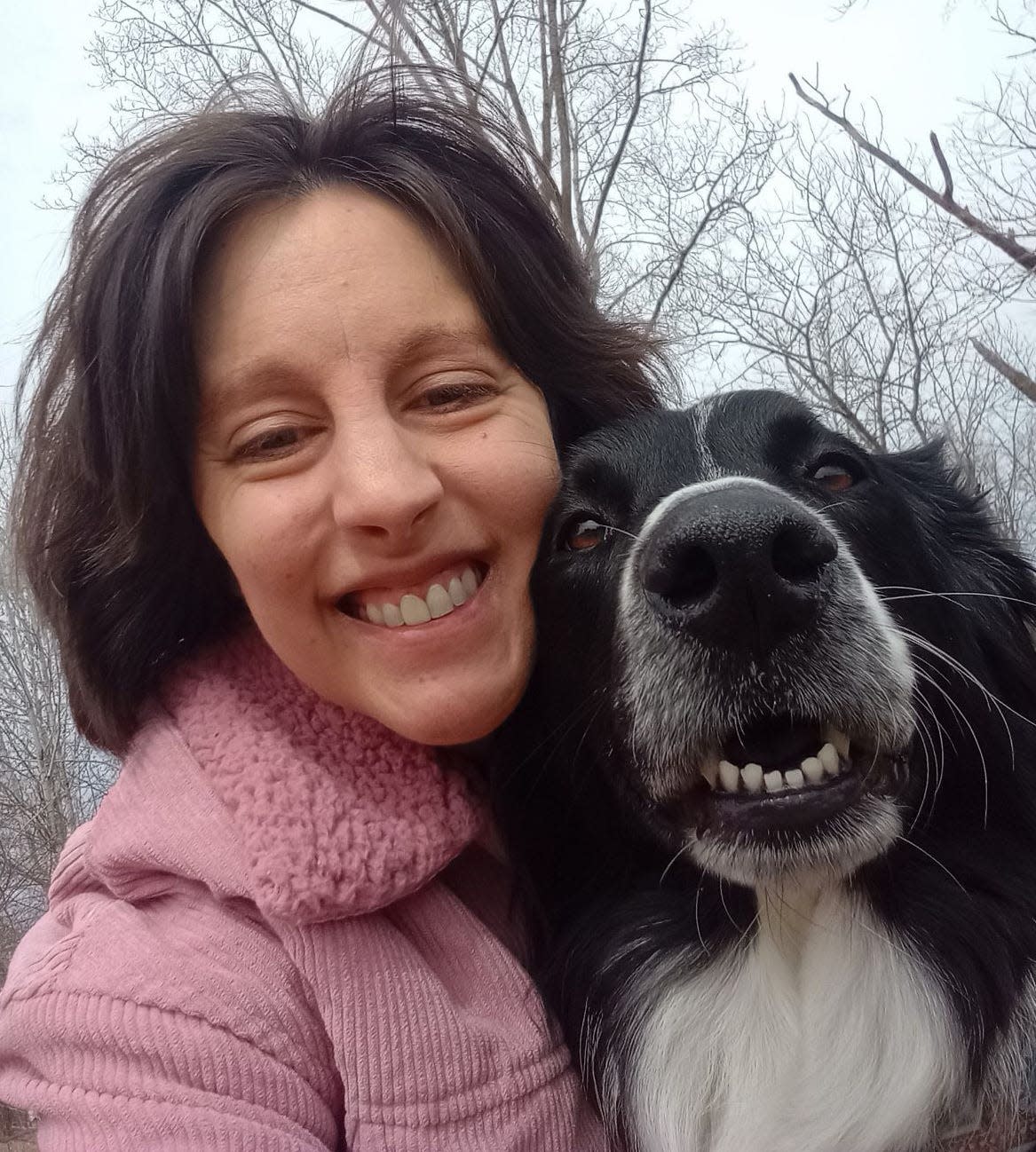 Tiffany Wygant, 39, of Reed City and her dog Tucker.