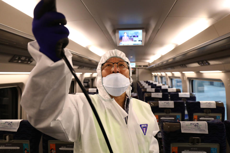 SEOUL, SOUTH KOREA - JANUARY 24: A disinfection worker wearing protective gears spray anti-septic solution in an train amid rising public concerns over the spread of China's Wuhan Coronavirus at SRT train station on January 24, 2020 in Seoul, South Korea. The number of cases of a deadly new coronavirus rose to over 800 in mainland China as health officials stepped up efforts to contain the spread of the pneumonia-like disease which medicals experts confirmed can be passed from human to human. The number of those who have died from the virus in China climbed to twentyfive on Wednesday and cases have been reported in other countries including the United States,Thailand, Japan, Taiwan and South Korea. (Photo by Chung Sung-Jun/Getty Images)