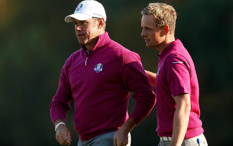 Lee Westwood and Luke Donald of Europe on the fifth green - Getty Images