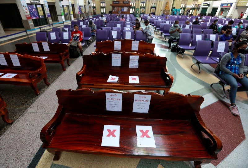 Social distancing marks are seen on the seats due to coronavirus disease (COVID-19) outbreak, at a train station in Bangkok