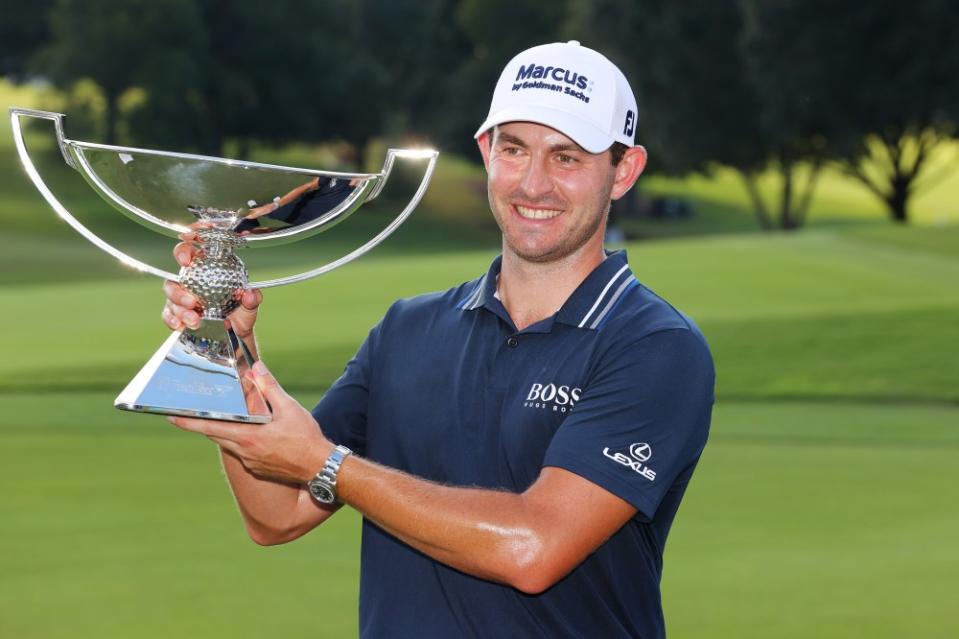 Patrick Cantlay of the United States celebrates with the FedEx Cup after winning during the final round of the TOUR Championship at East Lake Golf Club on September 05, 2021, in Atlanta, Georgia. (Photo by Kevin C. Cox/Getty Images)