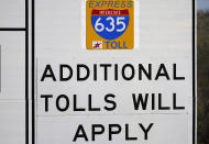 An express lanes highway sign marks an entrance in Dallas, Friday, March 3, 2023. There is growing interest in the South in fee-based express lanes in which some drivers can up to avoid congestion on highways where other drivers can access general lanes for free. (AP Photo/LM Otero)