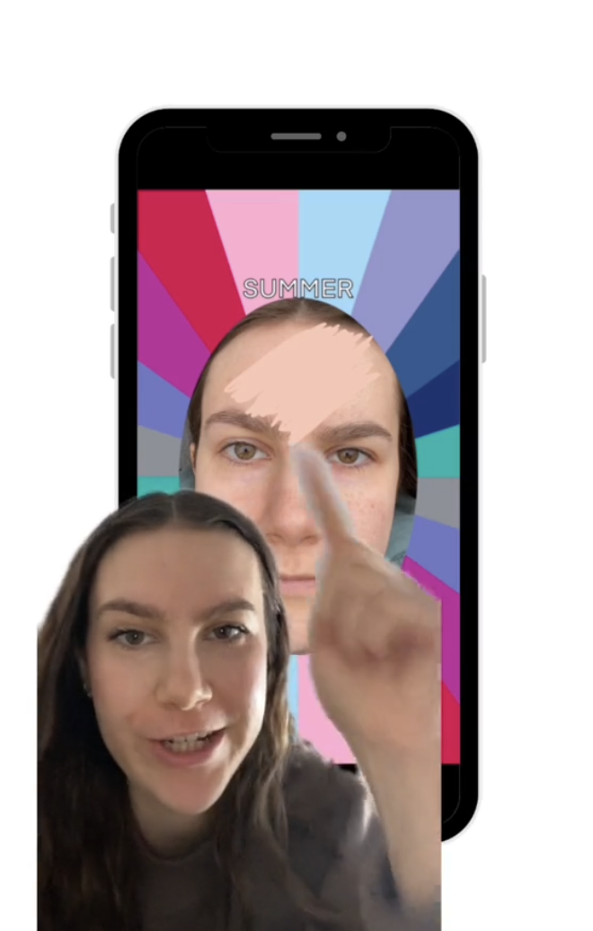 A person points to a smartphone displaying a face labeled "Summer" on the screen. Various colors radiate behind the face on the phone display