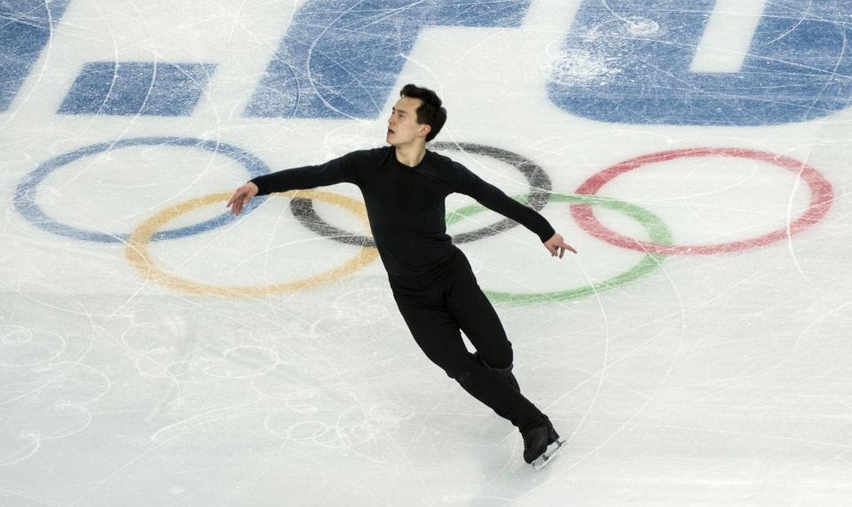 Canada's Patrick Chan goes through his routine during a figure skating practice at the 2014 Winter Olympics Wednesday, Feb. 5, 2014 in Sochi, Russia. (AP Photo/The Canadian Press, Paul Chiasson)