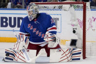New York Rangers goaltender Igor Shesterkin (31) makes a save in the second period of Game 2 of the NHL hockey Stanley Cup playoffs Eastern Conference finals against the Tampa Bay Lightning, Friday, June 3, 2022, in New York. (AP Photo/John Minchillo)