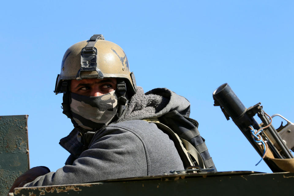 <p>A member of the Iraqi rapid response forces takes part in an operation against Islamic State militants south of Mosul, Iraq, Feb. 20, 2017. (Alaa Al-Marjani/Reuters) </p>