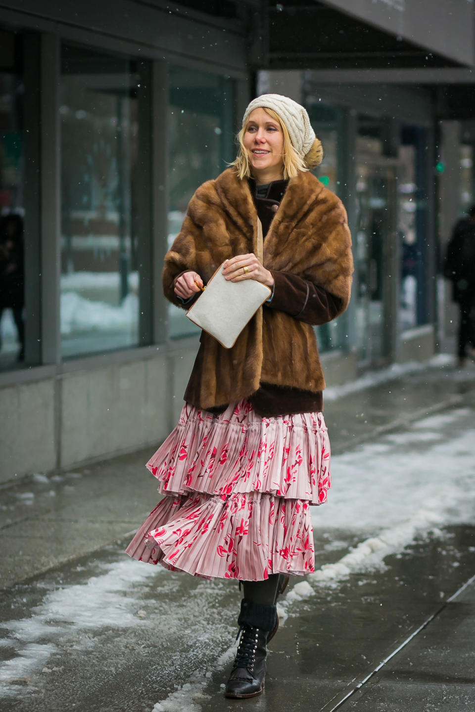 A vintage fur coat and tiered skirt are an unexpected combination at New York Fashion Week.