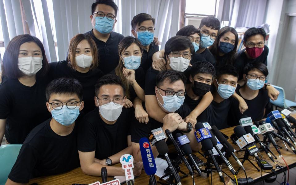 Pro-democracy campaigners and winners of primaries ahead of Hong Kong's Legislative Council elections in September pictured ahead of a press conference on Wednesday. - JEROME FAVRE/EPA-EFE/Shutterstock/ Shutterstock