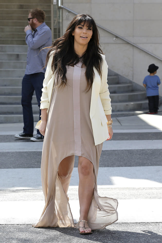 Kim Kardashian wore this ill-fitting midi/maxi dress teamed with a white blazer to pick up some frozen yoghurt. Copyright [Splash]