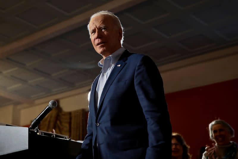 Democratic U.S. presidential candidate and former U.S. Vice President Joe Biden makes his way to the microphone at the start of a campaign event in Georgetown