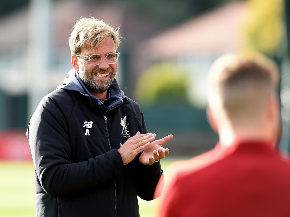 Jurgen Klopp believes his side aren't far behind league leaders Manchester City: Getty