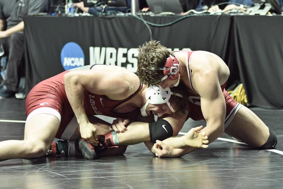 Lock Haven’s Tyler Stoltzfus aims to finish off a takedown of Oklahoma’s Tate Picklo in their 174-pound consolation first round match of the NCAA Championships on Thursday, March 16, 2023 at the BOK Center in Tulsa, Okla. Picklo ended Stoltzfus, who is a St. Joseph’s Catholic Acadmey grad, 11-3.