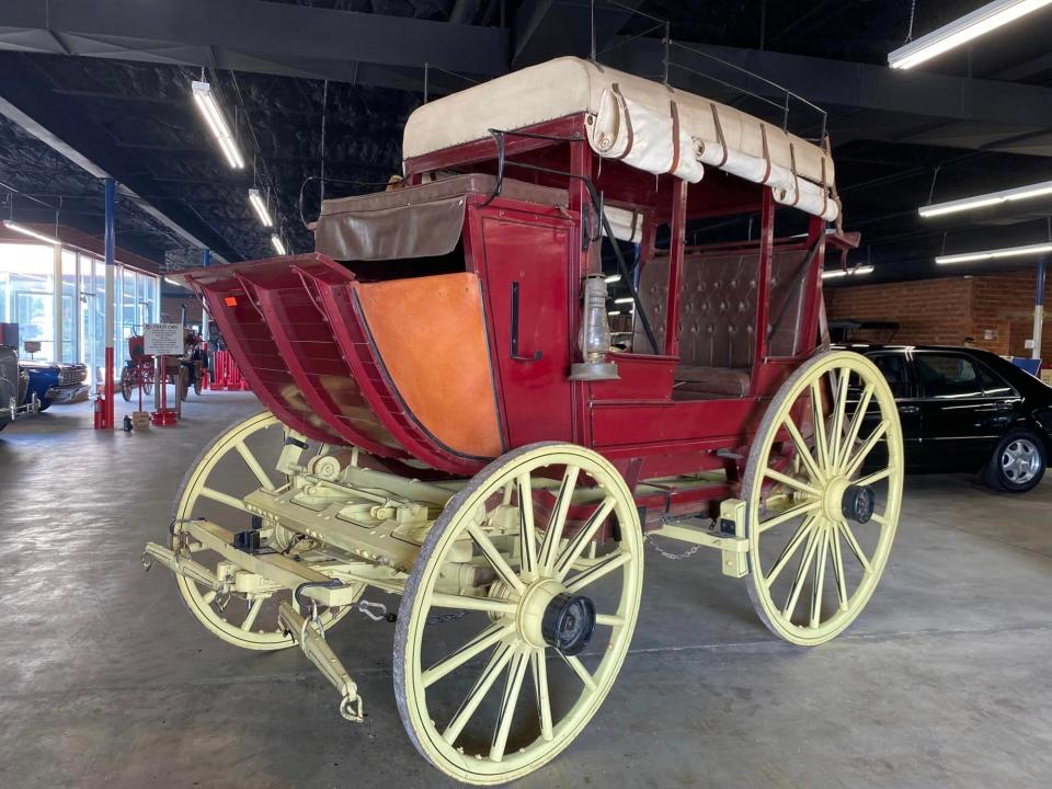 This stagecoach is among items to be auctioned this month at the late Harry Patterson's Crazy Cars Museum.