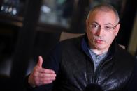 Former Russian tycoon Mikhail Khodorkovsky speaks during an interview with Reuters in central London, Britain