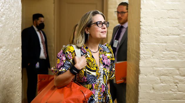 Sen. Kyrsten Sinema (D-Ariz.) leaves her office to walk to the Senate Chambers in the U.S. Capitol Building on Aug. 2 in Washington, D.C. (Photo: Anna Moneymaker via Getty Images)