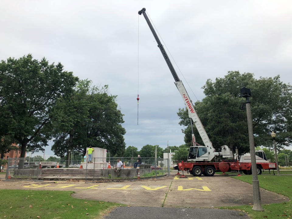 A heavy crane that will be used to help dig up the remains of former Confederate Lt. Gen. Nathan Bedford Forrest and his wife at Health Sciences Park in Memphis, Tennessee.  (Photo: Adrian Sainz via AP)