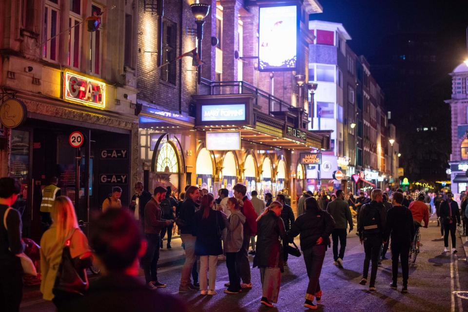 Crowds spilled onto streets in Soho last night (PA)