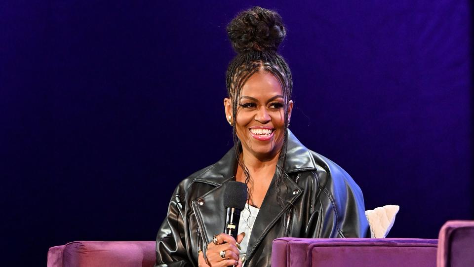 Former First Lady Michelle Obama speaks onstage during the Michelle Obama: The Light We Carry Tour at The Fox Theatre on December 02, 2022 in Atlanta, Georgia.