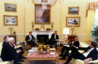 President Clinton meets with Congressional leaders in the Oval Office to discuss the fiscal year 1998 budget before departing for his Russian summit trip, March 19. Pictured are (L-R) Sen. Frank Lautenberg (D-NJ), Rep. John Spratt (D-SC), obscured, Vice-President Al Gore, Sen. Peter Domenici (R-NM) and Rep. John Kasich (R-OH).