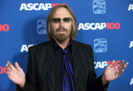 FILE PHOTO: Musician Tom Petty poses at the 31st annual ASCAP Pop Music Awards in Hollywood, California, U.S. on April 23, 2014. REUTERS/Mario Anzuoni/File Photo