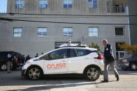 A journalist gets in a self-driving GM Bolt EV during a media event in San Francisco, California, U.S. November 28, 2017. REUTERS/Elijah Nouvelage