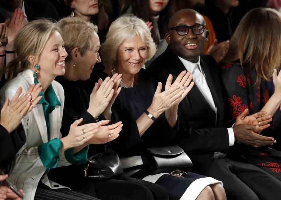 Duchess Of Cornwall and editor-in-chief of British Vogue magazine Edward Enninful applaud during the Bethany Williams show (Getty Images)