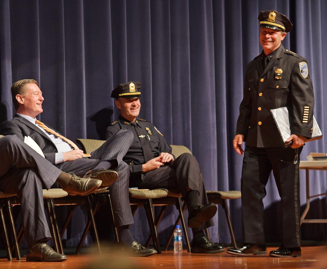 In 2021, Police Chief Steven Sargent, right, shares the stage with City Manager Ed Augustus, left, at a Police Department awards ceremony.