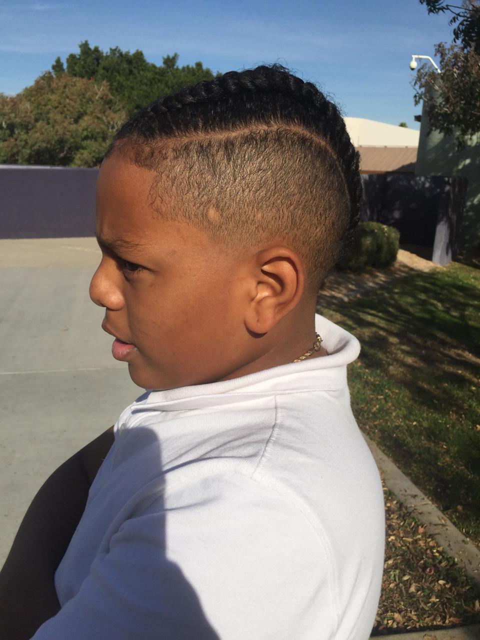 Nasir, 12, had been wearing his hair in braids for six months when his school objected, per its dress code. (Photo: Courtesy of Brittany Anderson)