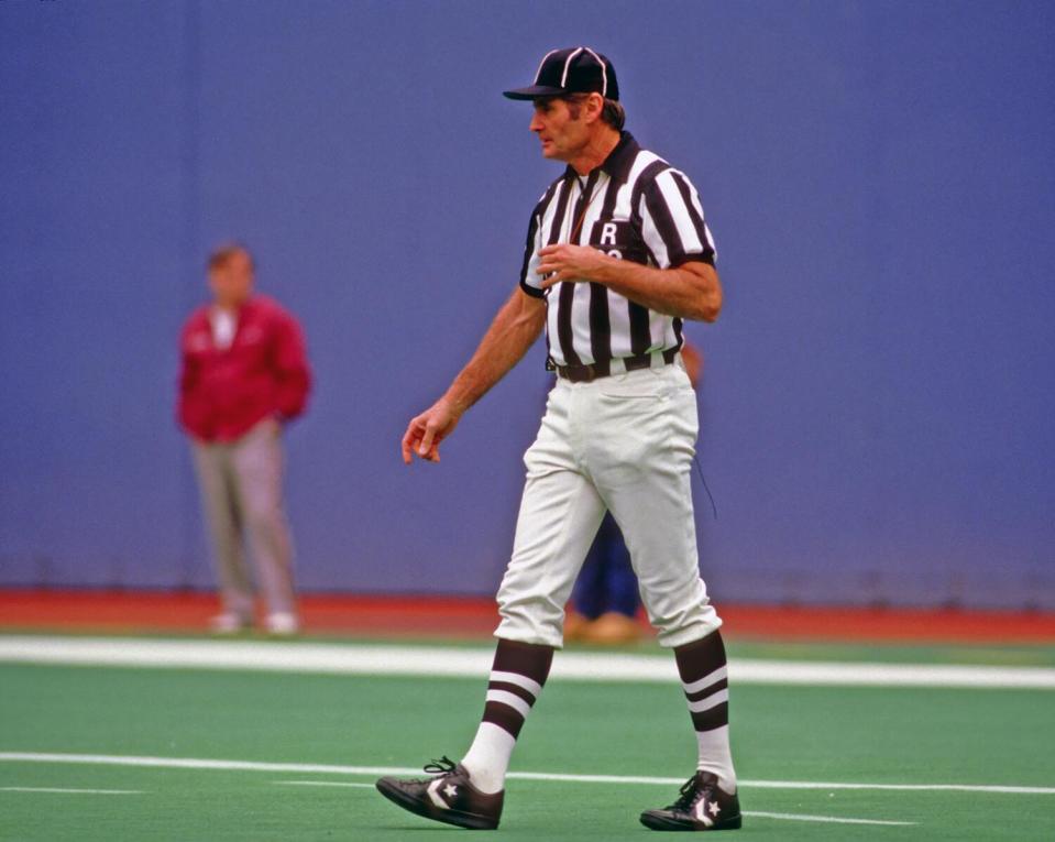 Referee Jim Tunney watches action during a Bengals-Steelers game at Three Rivers Stadium in 1986.
