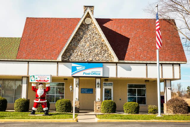 <p>David Williams</p> The Santa Claus Post Office is the only post office in the world with the Santa Claus name. During the Christmas season over 20,000 letters are answered by Santa's Elves and returned to children all over the world. Postal worker, Marian Balbach, stamps letters with the official Santa Calus postmark.