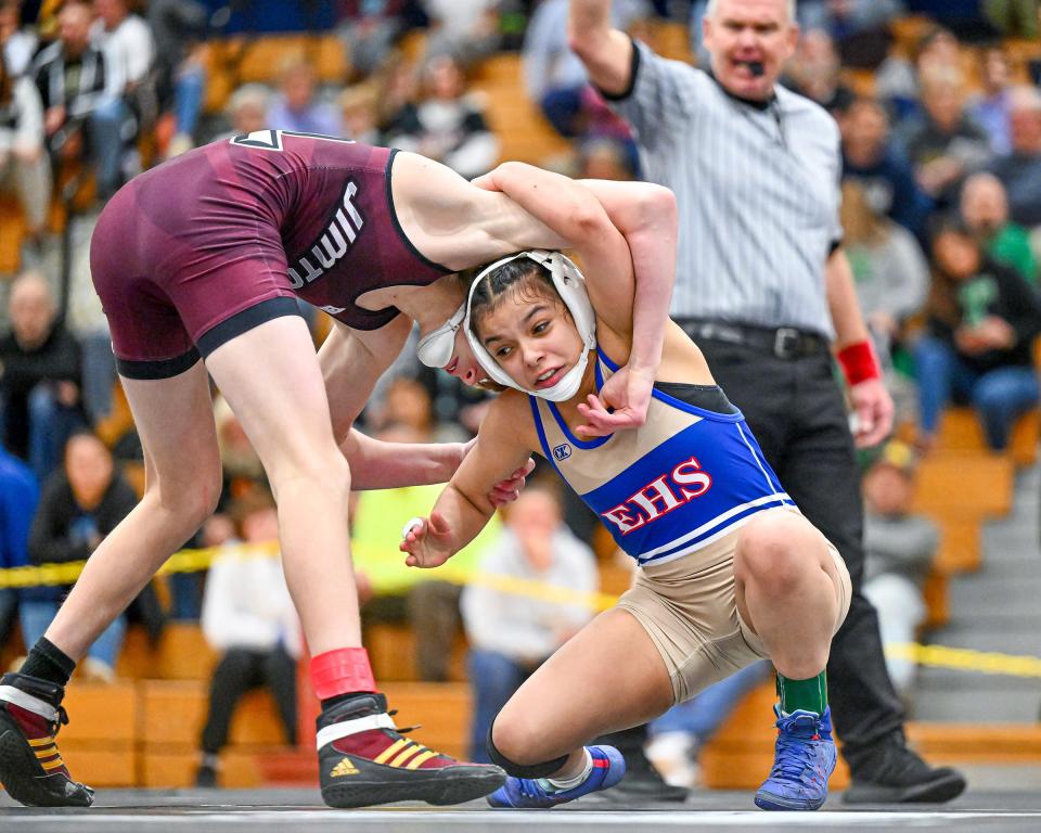 Jimtown’s Aden Hartman, left, and Elkhart’s Genesis Ramirez wrestle in the 106 lb. championship Saturday, Jan. 14, 2023, at Elkhart High School. Hartman won.