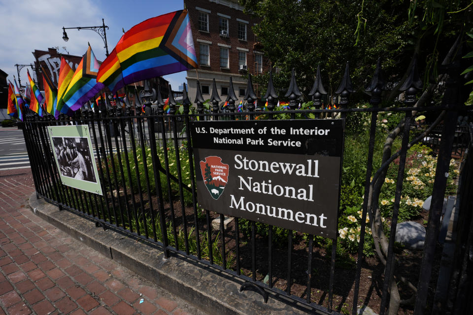 A National Park Service sign marks the Stonewall National Monument outside the Stonewall Inn, Monday, June 17, 2024, in New York. The building will open as the new visitor center for the Stonewall National Monument on Friday, June 28, the anniversary of the 1969 rebellion that helped reshape LGBTQ+ life in the United States. (AP Photo/Pamela Smith)