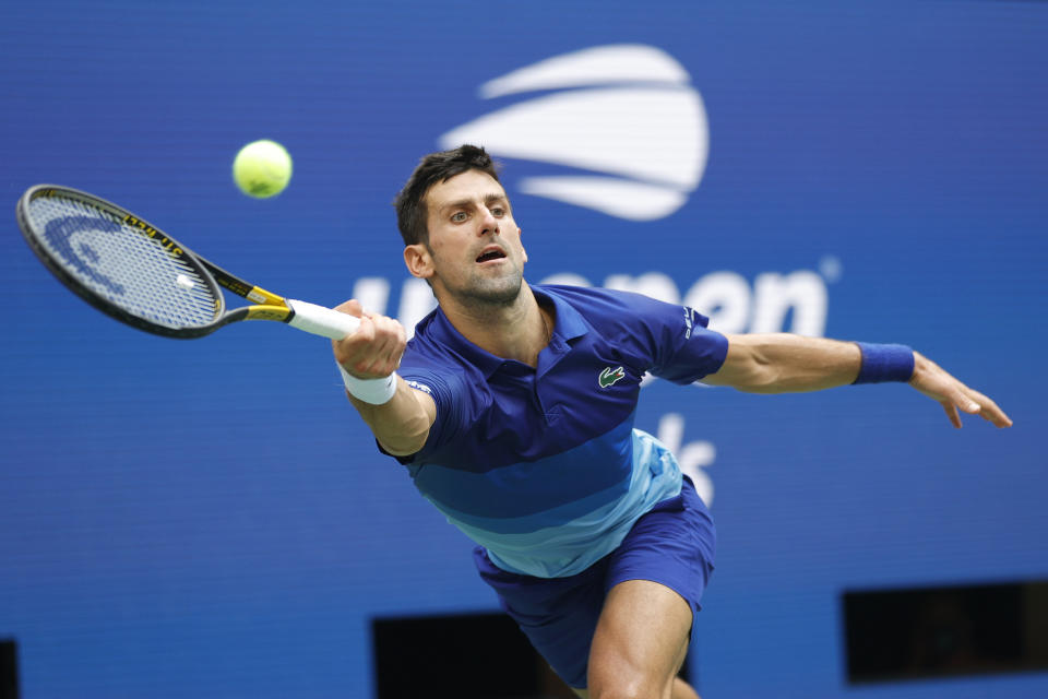 Seen here, Novak Djokovic returns the ball against Daniil Medvedev in the men's US Open final.