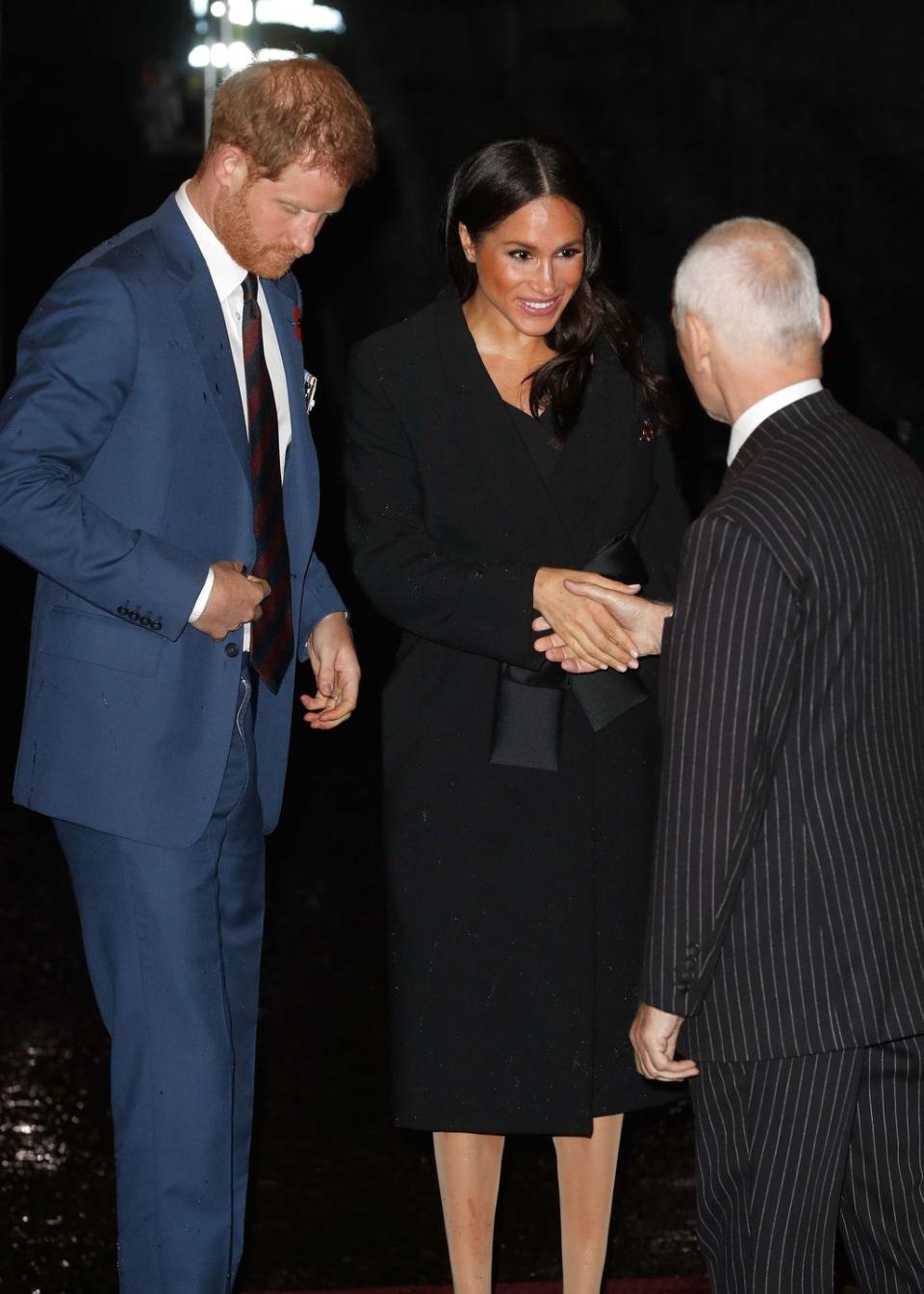 <p>Meghan Markle sporting a <a href="https://www.net-a-porter.com/gb/en/Shop/Designers/Stella_McCartney" rel="nofollow noopener" target="_blank" data-ylk="slk:Stella McCartney;elm:context_link;itc:0;sec:content-canvas" class="link ">Stella McCartney</a> tie-detail coat (similar available here), over a black off-the-shoulder sheath dress by <a href="https://www.marksandspencer.com/double-crepe-bodycon-dress/p/p60214005?OmnitureRedirect=Double+Crepe+Bodycon+dress&source=affwindow&extid=af_a_Uncategorised_78888_Skimlinks&comgp=78888&cvosrc=affiliate.aw.78888&awc=1402_1542373349_f71aaa32f86cc1248315059389886495" rel="nofollow noopener" target="_blank" data-ylk="slk:M&S (which is only £49.50);elm:context_link;itc:0;sec:content-canvas" class="link ">M&S (which is only £49.50)</a> to Royal Albert Hall on Saturday.</p><p>The event - which was the first Remembrance service attended by Markle since she joined the royal family earlier this year - saw the pregnant star team the look with a <a href="https://www.net-a-porter.com/gb/en/Shop/Designers/Stella_McCartney" rel="nofollow noopener" target="_blank" data-ylk="slk:Stella McCartney;elm:context_link;itc:0;sec:content-canvas" class="link ">Stella McCartney</a> shaggy deer faux leather crossbody bag, her favourite Manolo Blahnik black suede BB pumps, and earrings by Zofia Day<br></p>