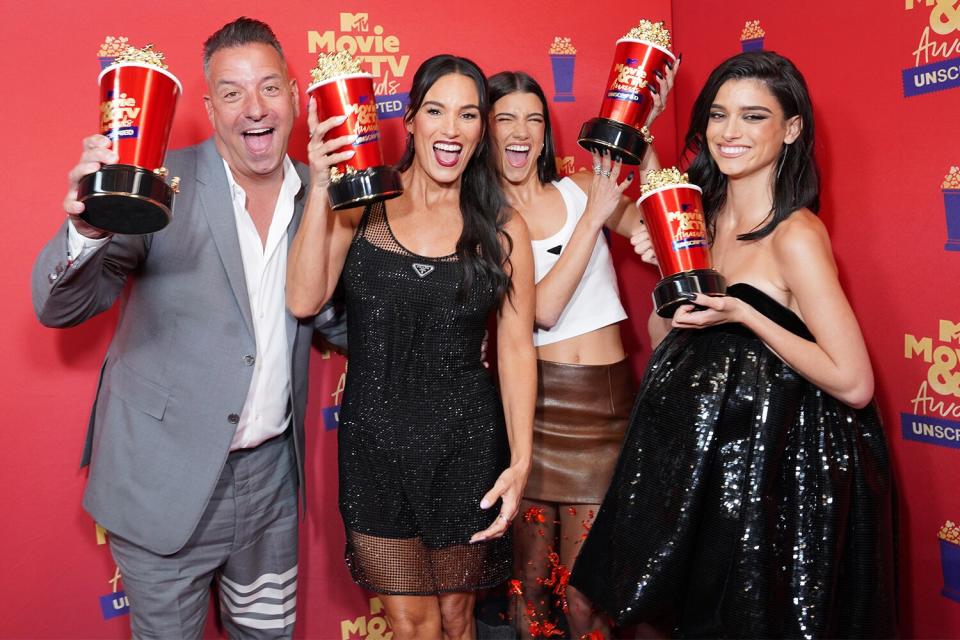 In this image released on June 5, (-(L-R) Marc D'Amelio, Heidi D'Amelio, Charli D'Amelio, and Dixie D'Amelio attend the 2022 MTV Movie &amp; TV Awards: UNSCRIPTED at Barker Hangar in Santa Monica, California and broadcast on June 5, 2022.