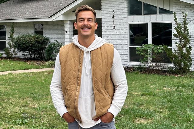 <p>Aaron Erb/Instagram</p> Aaron Erb in front of his new house in October 2023