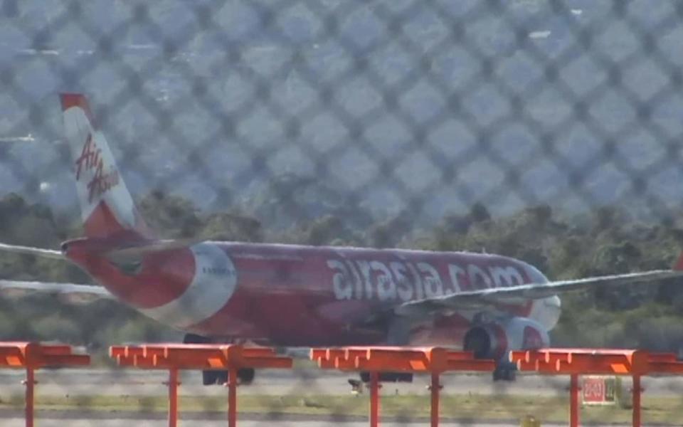 Air Asia plane taxiing - Credit: APTN