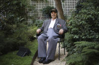 Gregory J. Melikian, a 20-year old Sergeant working in SHAEF headquarters of Supreme Commander General Dwight D. Eisenhower in 1944 and 1945, and a witness in the surrender of the high German Authorities in Reims, France, poses during an interview with the Associated Press Friday, Aug.23, 2019 in Paris. Melikian was part of a group of World War II veterans taking part in commemorations of the 75th anniversary of the Allied operation to liberate Paris from Nazi occupation. (AP Photo/Daniel Cole)