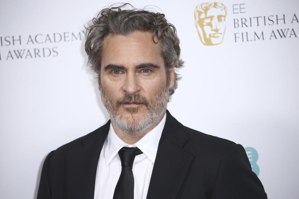 Actor Joaquin Phoenix poses for photographers upon arrival at the Bafta Nominees Party, in central London, Saturday, Feb. 1, 2020. (Photo by Joel C Ryan/Invision/AP)