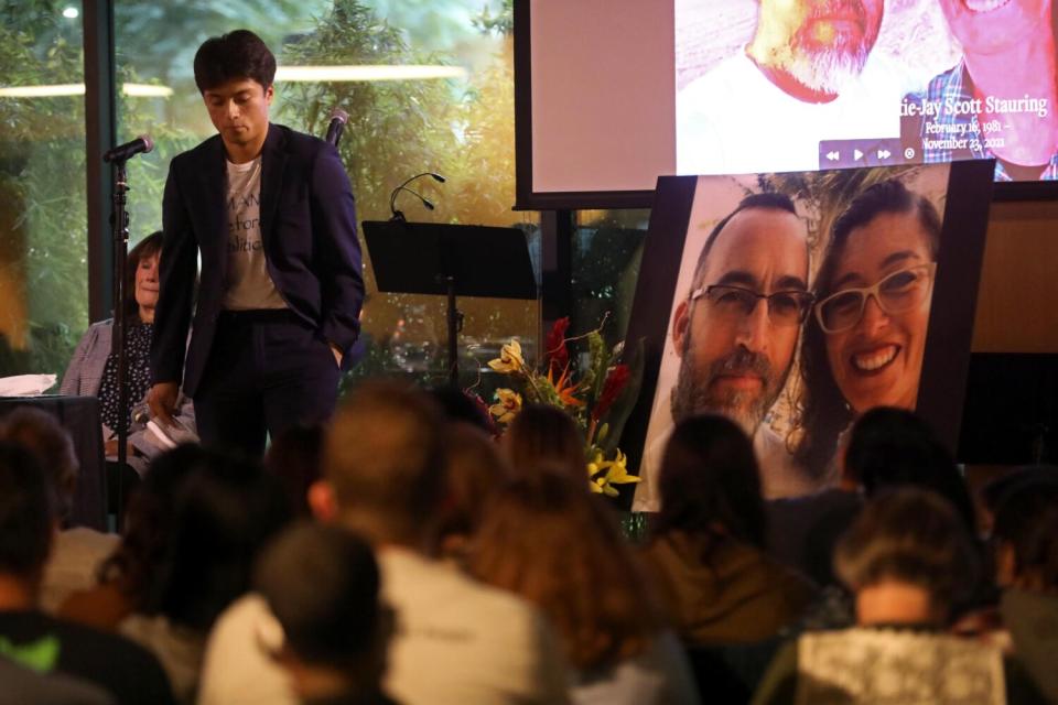 Gabo Stauring remembers his father and stepmother at the end of a memorial speech during a celebration of life.