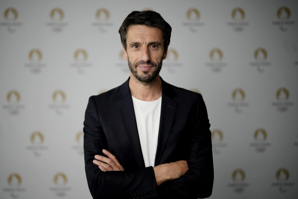 Paris 2024 Olympics Organizing Committee President Tony Estanguet poses for a photo during an interview with the Associated Press at the headquarters of Paris 2024 in Saint-Denis, outside Paris, France, Tuesday, June 27, 2023. Estanguet who won gold medals for canoeing in the 2000, 2004 and 2012 Olympic Games is now the face and chief organizer of the 2024 Paris Games. In a wide-ranging interview with The Associated Press, Estanguet talks about the two French police probes into Olympic-related contracts, and insists they bear no comparison with corruption and ethics scandals that have dogged the Olympic movement and its flagship money-spinning event for decades. (AP Photo/Christophe Ena)