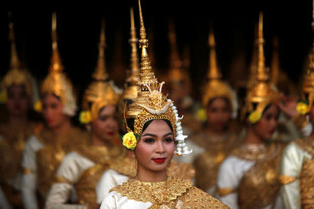 Cambodian traditional dancers attend an event to mark the 40th anniversary of the toppling of Pol Pot's Khmer Rouge regime at the Olympic stadium in Phnom Penh, Cambodia, January 7, 2019. REUTERS/Samrang Pring